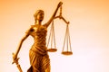 Legal law concept image, Scales of Justice, golden light. Royalty Free Stock Photo