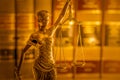 Legal law concept image, Scales of Justice, golden light.