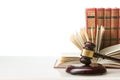 Legal Law and Justice concept - Open law book with a wooden judges gavel on table in a courtroom or law enforcement office. Copy Royalty Free Stock Photo