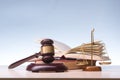 Legal Law and Justice concept - Open law book with a wooden judges gavel on table in a courtroom or law enforcement Royalty Free Stock Photo