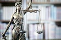 Legal and law statue of Lady Justice scales of justice and books Royalty Free Stock Photo