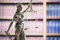 Legal and law statue of Lady Justice scales of justice and law books Royalty Free Stock Photo