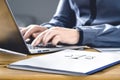 Legal worker in law firm with laptop computer. Attorney, prosecutor or solicitor working on a legislation case. Royalty Free Stock Photo