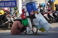 Legen seller lahang,  palm wine, badeg on the street. Legen is an Indonesian traditional drink made off palm tree nectar Royalty Free Stock Photo