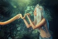 Legend mythical Nagga woman queen sea touch holds milk snake in hands. Blond girl long white flowing hair. Backdrop