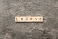 legend word written on wood block. legend text on cement table for your desing, concept