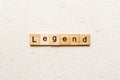 legend word written on wood block. legend text on cement table for your desing, concept