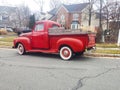 legendary American pickup truck of the 50s Ford F-100 is parked on the side of the road Royalty Free Stock Photo