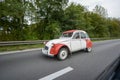 The legendary beetle Citroen retro car is a very rare car on the highway in Belgium. Royalty Free Stock Photo