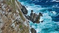 The legendary Cape of Good Hope. Sharp rocks rise from turquoise water. Royalty Free Stock Photo