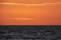 Legendary `green flash` as the sun dips below the horizon at sunset