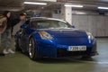 legendary Japanese sports car, the Nissan 350Z in blue tuned with lowered suspension
