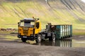 Legendary Scania 93 / 113 Swedish truck for container transportation in Icelandic landscape in water pool