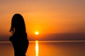 Woman at vacation at sunset, tourism concept Royalty Free Stock Photo