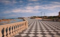 Leghorn Livorno, Tuscany, Italy:  landscape at dawn of the promenade Mascagni Terrace, a picturesque seashore on the Ligurian Royalty Free Stock Photo