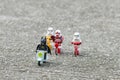 Lego batman riding scooter with stormtrooper riding bicycle on patrol