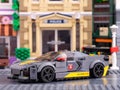 Lego Chevrolet Corvette C8.R race car by LEGO Speed Champions on Lego city street