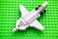 Lego custom made fighter jet on Lego green baseplate