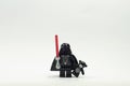 Lego darth vader minifigure holding teddy bear