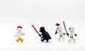 lego darth vader and stormtroopers chasing chicken suit guy.
