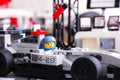 Lego driver sitting in McLaren Mercedes MP4-29 race car Royalty Free Stock Photo