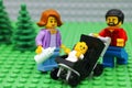 Lego family with baby in park