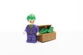 Lego the joker holding a case of money stock photography and images
