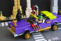 Lego The Joker Notorious Lowrider in the city street with Batman, The Joker, Harley Quinn