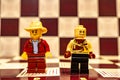 Lego man with hat and monste