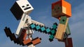 Lego Minecraft large action figure of Alex with diamond sword fighitng with skeleton archer.