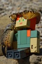 LEGO Minecraft large figure of Alex with large dried crab cephalothorax on head as helmet and crab arm. Royalty Free Stock Photo