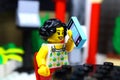 Lego mini-figure woman making a phone call Royalty Free Stock Photo