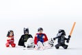 LEGO minifigure Batman, Superman, Stormtrooper and darth vader.