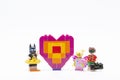 Lego minifigure character with brick of love