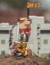 Lego minifigure of medieval knight on little horse