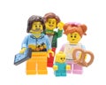 Lego minifigures family in vacation isolated on white