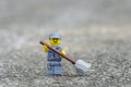 Lego minifigures series 15 janitor minifigure cleaning the street