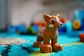 Lego plastic dog figurine on a floor