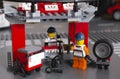 Lego Porsche crew with tools in the mini-garage