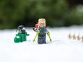 lego star wars minifigure bounty hunter Boba fett trekking on snow