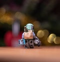 lego star wars minifigure bounty hunter Boba Fett walking with camera