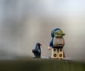 lego star wars minifigure with yoda in the bag Royalty Free Stock Photo