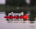 Lego star wars minifigures stormtrooper swimming on the boat Royalty Free Stock Photo