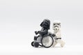 Lego storm trooper pushing wheelchair with injured darth vader Royalty Free Stock Photo