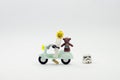 Lego stormtrooper with smiling face riding scooter