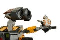 LEGO Wall-E robot from Disney Pixar movie holding small model of spherical Star Wars repair droid BB8 on his left arm