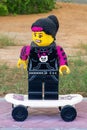 Legoland Dubai Amusement Park Lego girl skateboarder and man. Luxury travel