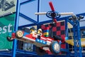 Legoland Dubai Imagination time machine statue for children entrance sign with a blue sky background. Luxury travel resort