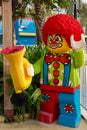 Legoland Dubai Theme Park Resort for children Lego clown statue holding a musical instrument. Luxury travel resort destination