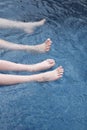 The legs of an adult and a child Royalty Free Stock Photo